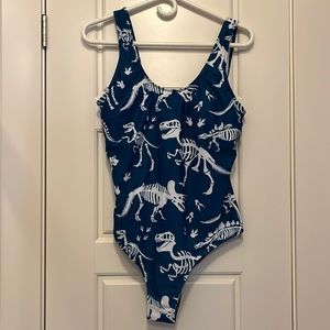 Teal dinotastic swimsuit. Never worn. XL